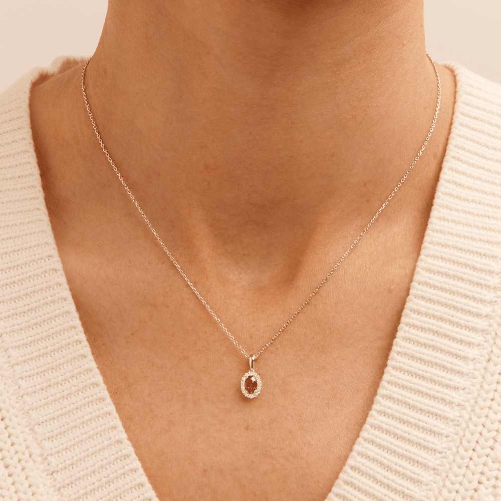 45cm Oval Created Ruby Halo Pendant Necklace with 0.13tw of Laboratory-Grown Diamonds in Sterling Silver and Platinum Pendants Bevilles 