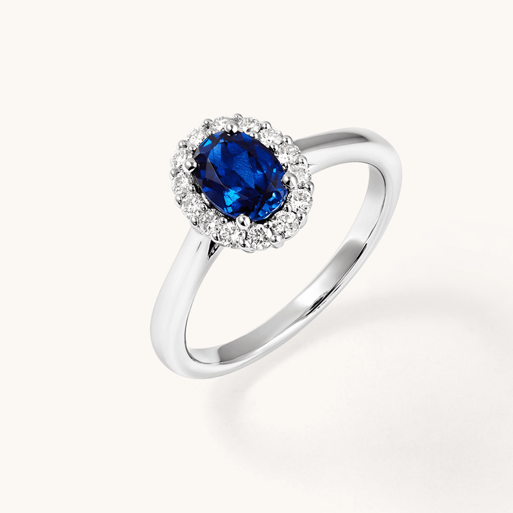 Oval Created Sapphire Halo Ring with 0.23tw of Laboratory-Grown Diamonds in Sterling Silver and Platinum Rings Bevilles 