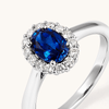 Oval Created Sapphire Halo Ring with 0.23tw of Laboratory-Grown Diamonds in Sterling Silver and Platinum Rings Bevilles 