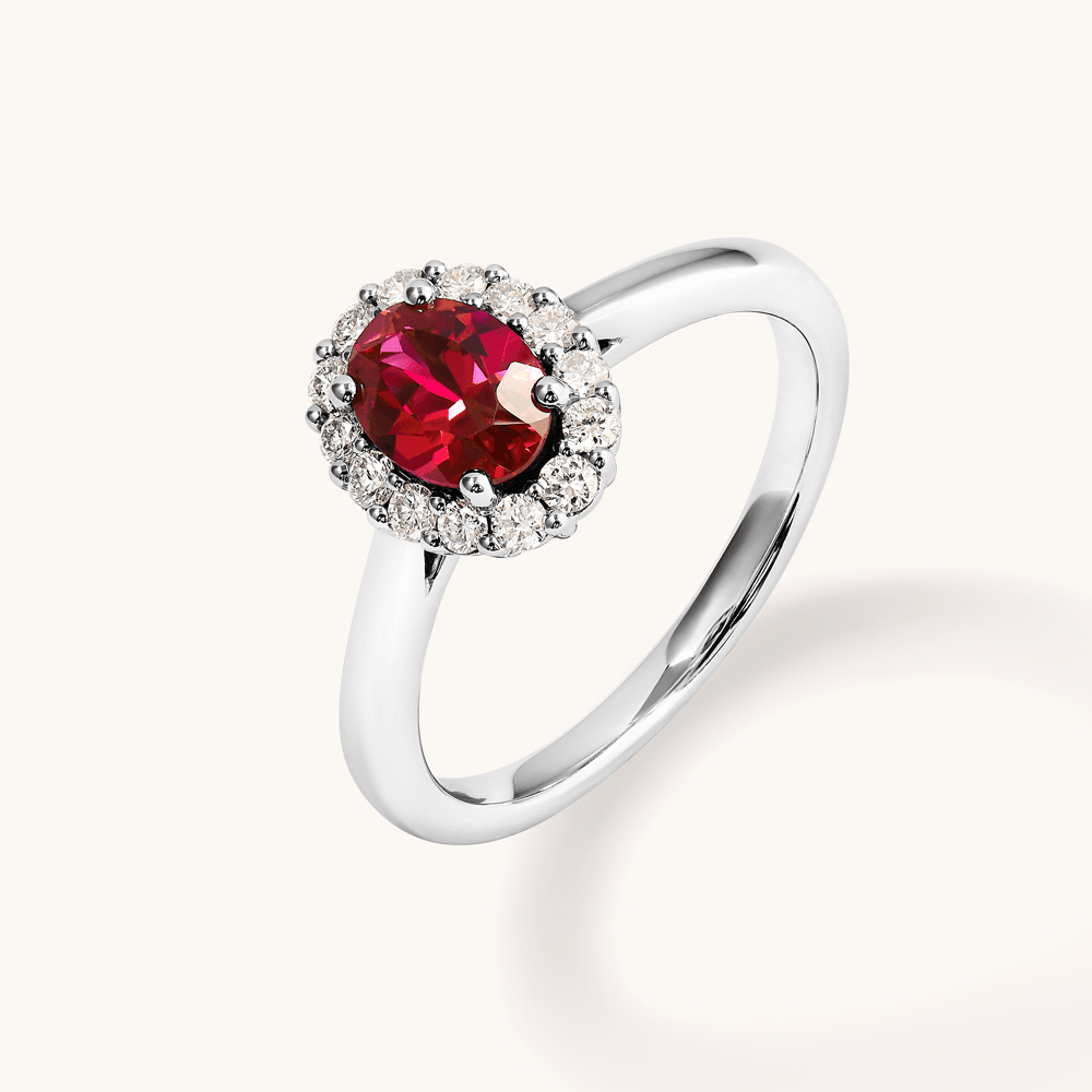 Oval Created Ruby Halo Ring with 0.23tw of Laboratory-Grown Diamonds in Sterling Silver and Platinum Rings Bevilles 