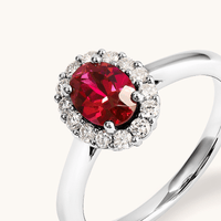 Oval Created Ruby Halo Ring with 0.23tw of Laboratory-Grown Diamonds in Sterling Silver and Platinum Rings Bevilles 