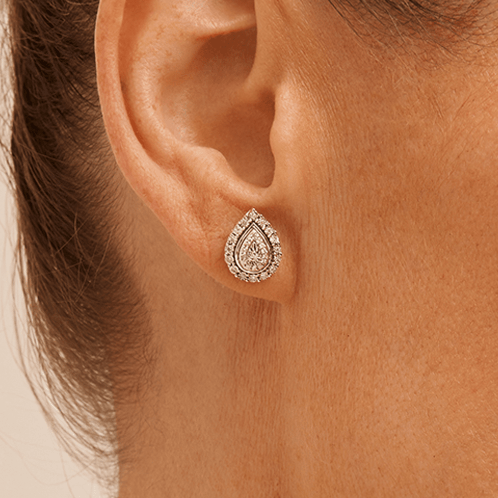 Miracle Set Pear Shaped Stud Earrings with 0.15tw of Diamonds in Sterling Silver Earrings Bevilles 