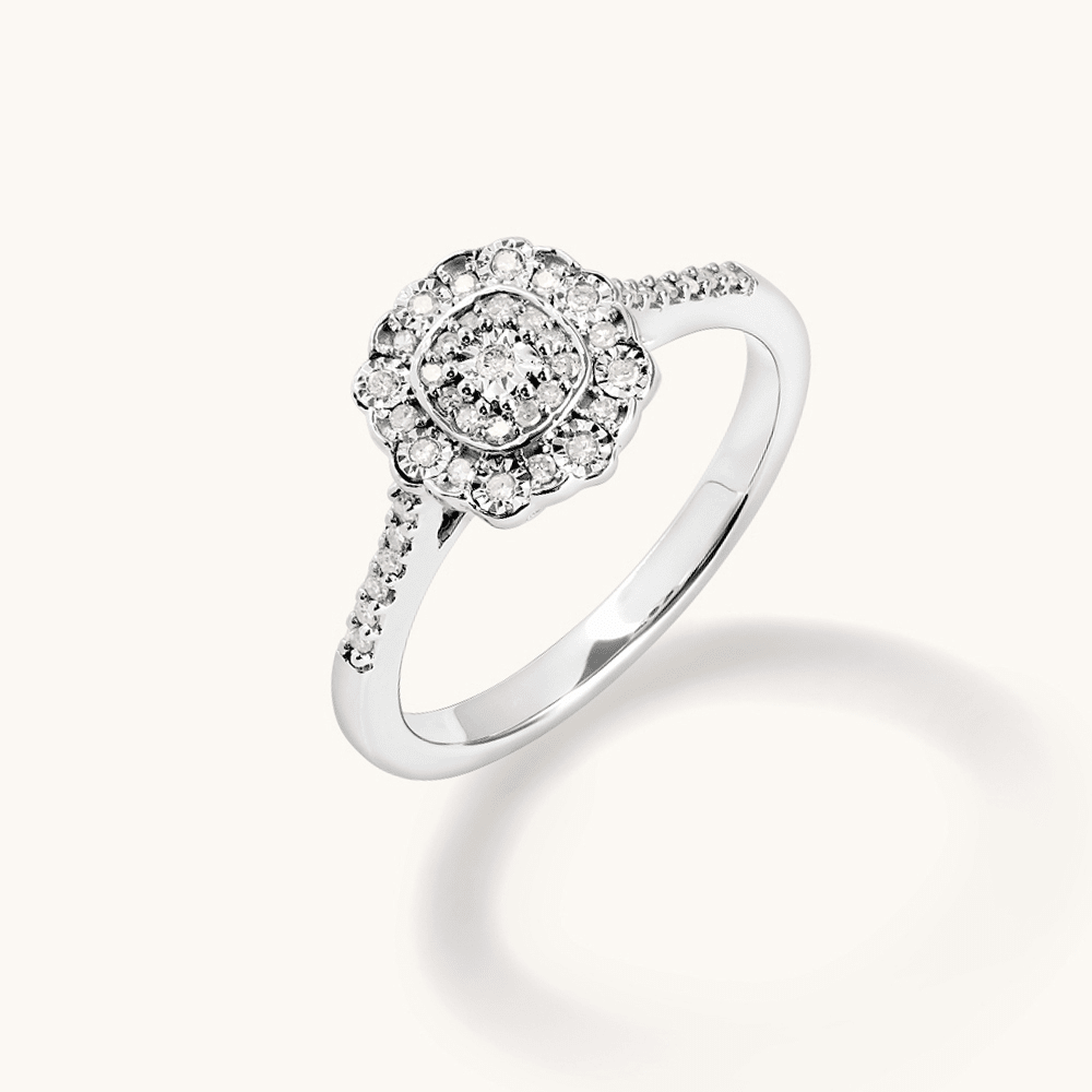 Round Shape Cluster Halo Ring with 0.15tw of Diamonds in Rhodium Plated Sterling Silver Rings Bevilles 