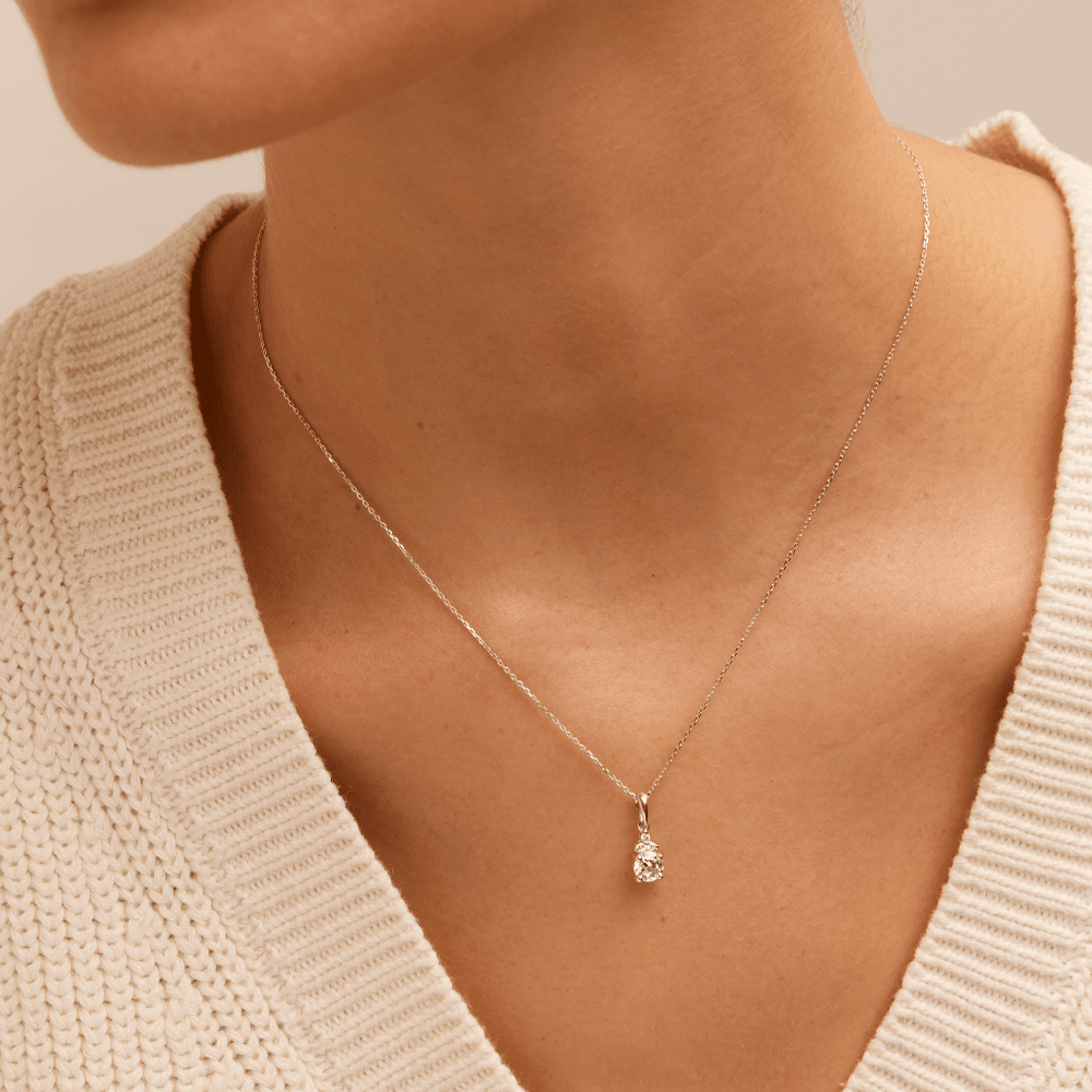 Birthstone Teardrop Pendant Necklace with Created White Sapphire and 0.05tw of Laboratory-Grown Diamonds in Sterling Silver and Platinum Pendants Bevilles 