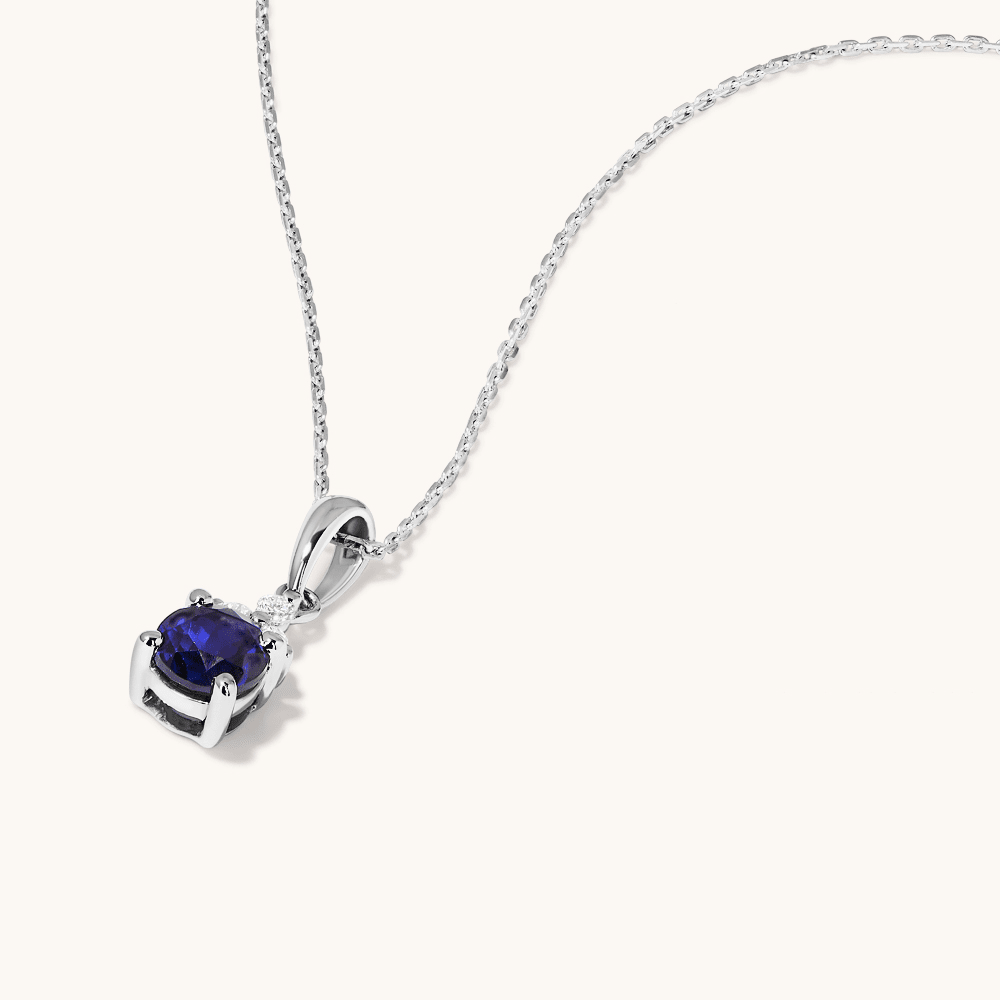 Birthstone Teardrop Pendant Necklace with Created Sapphire and 0.05tw of Laboratory-Grown Diamonds in Sterling Silver and Platinum Pendants Bevilles 