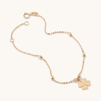 19cm Ball Station Bracelet with Clover Charm in 9kt Yellow Gold Bracelets Bevilles 
