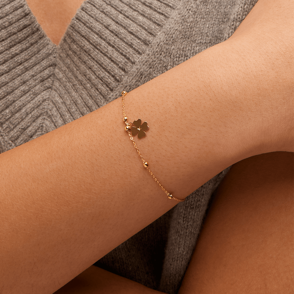 19cm Ball Station Bracelet with Clover Charm in 9kt Yellow Gold Bracelets Bevilles 