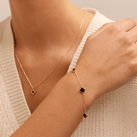 19cm Onyx Clover Station Bracelet in 9kt Yellow Gold Bracelets Bevilles 