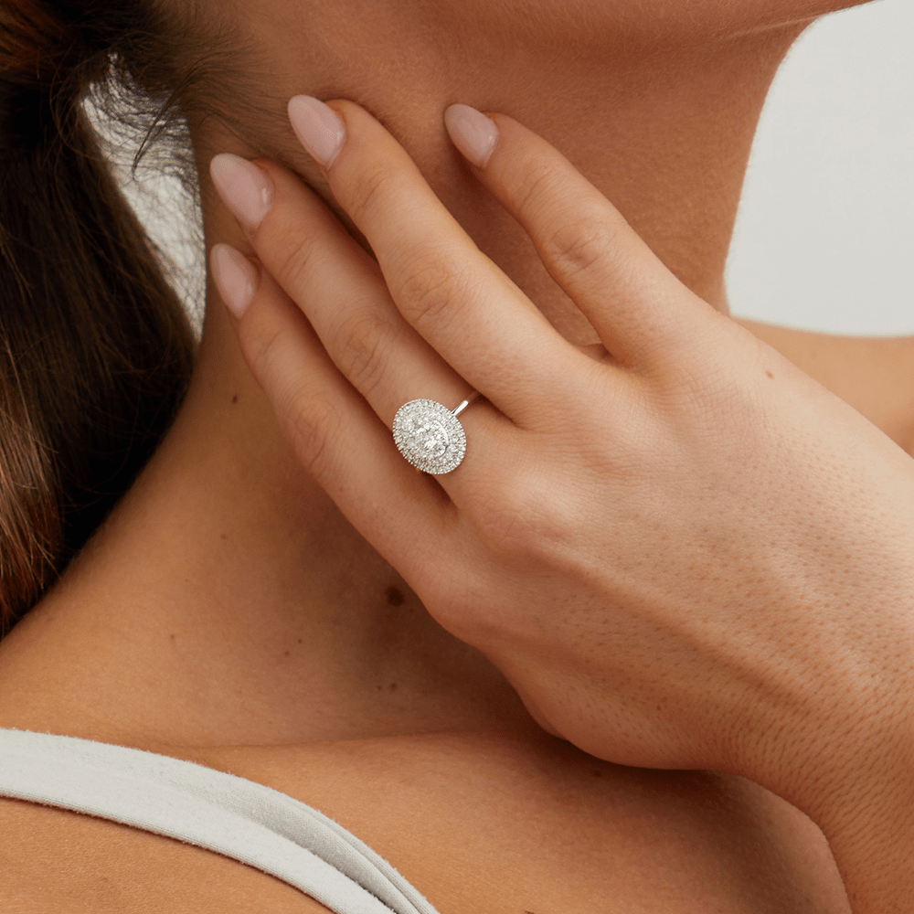 Oval Shaped Cluster Halo Ring with 0.75tw of Laboratory-Grown Diamonds in Sterling Silver and Platinum Rings Bevilles 