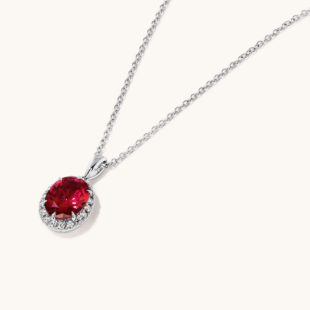45cm Oval Created Ruby Necklace with 0.18tw of Laboratory-Grown Diamonds in Sterling Silver and Platinum Necklaces Bevilles 