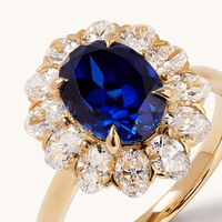 Oval Created Sapphire Halo Ring with 1.20tw of Laboratory-Grown Diamonds in 9kt Yellow Gold Rings Bevilles 