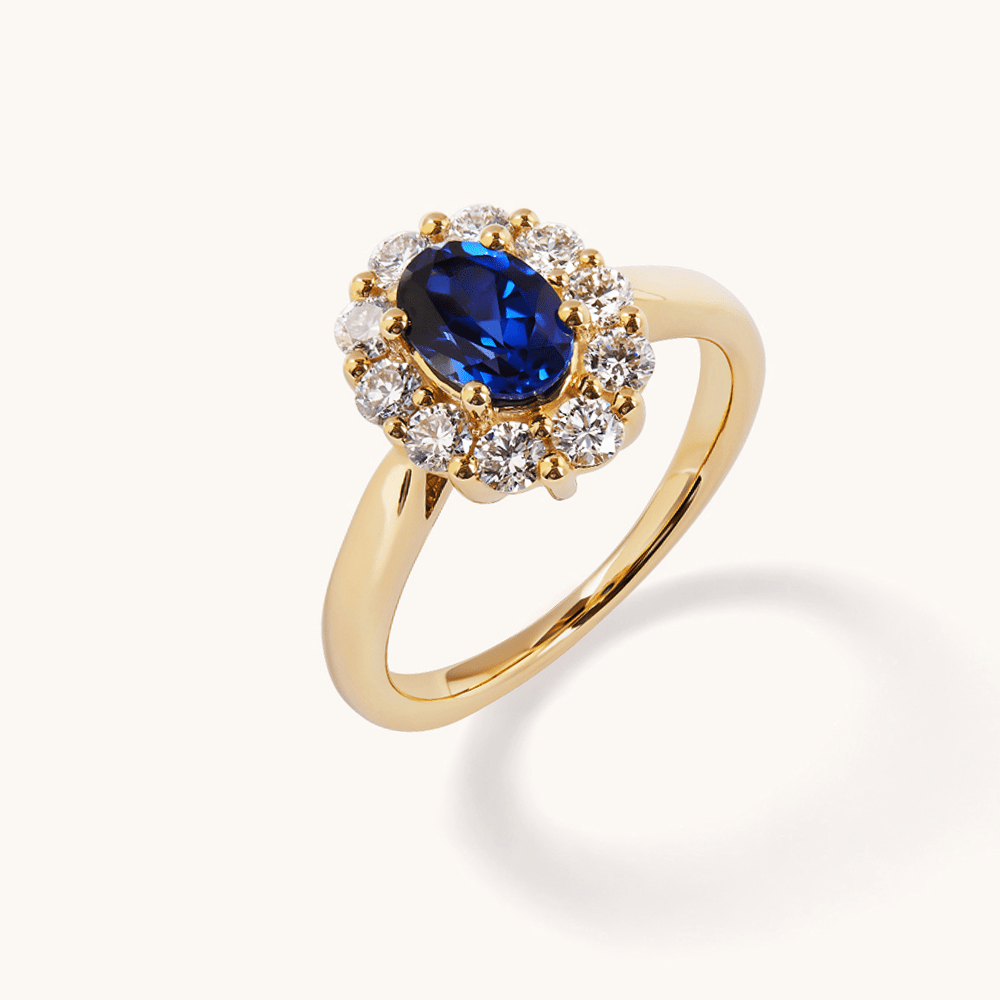 Oval Created Sapphire Halo Ring with 0.62tw of Laboratory-Grown Diamonds in 9kt Yellow Gold Rings Bevilles 