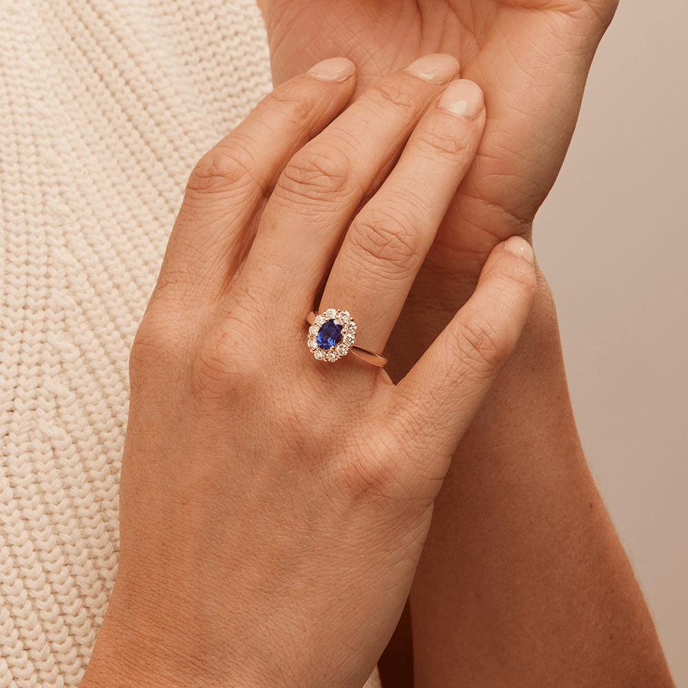 Oval Created Sapphire Halo Ring with 0.62tw of Laboratory-Grown Diamonds in 9kt Yellow Gold Rings Bevilles 