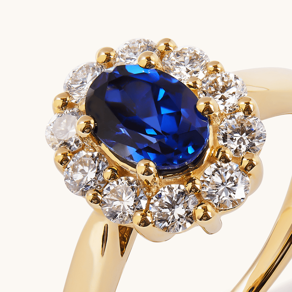 Oval Created Sapphire Halo Ring with 0.62tw of Laboratory-Grown Diamonds in 9kt Yellow Gold Rings Bevilles 