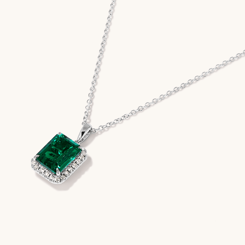 45cm Halo Oval Created Emerald Necklace with 0.18tw of Laboratory-Grown Diamonds in Sterling Silver and Platinum Pendants Bevilles 