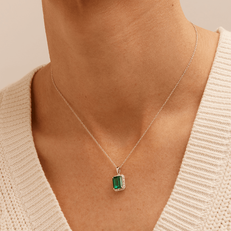 45cm Halo Oval Created Emerald Necklace with 0.18tw of Laboratory-Grown Diamonds in Sterling Silver and Platinum Pendants Bevilles 