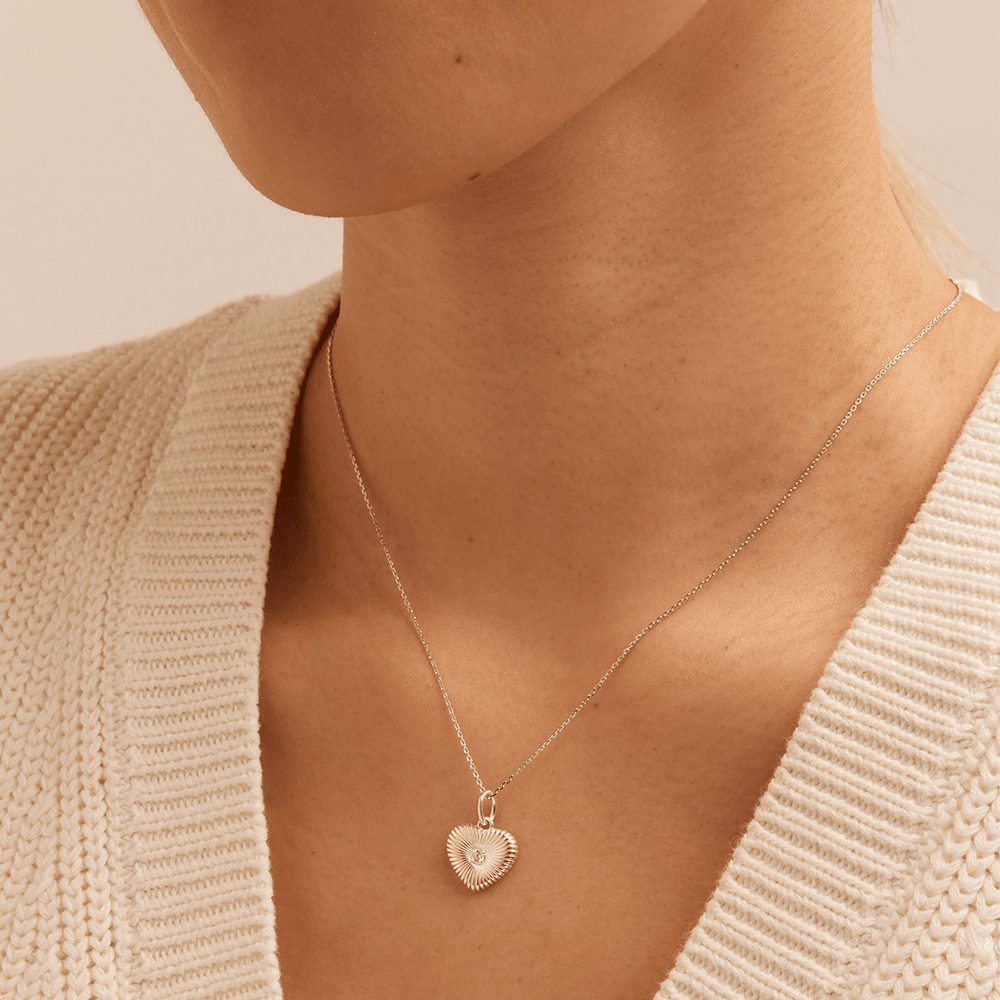 Cubic Zirconia Sunburst Heart Pendant in Sterling Silver Pendants Bevilles 