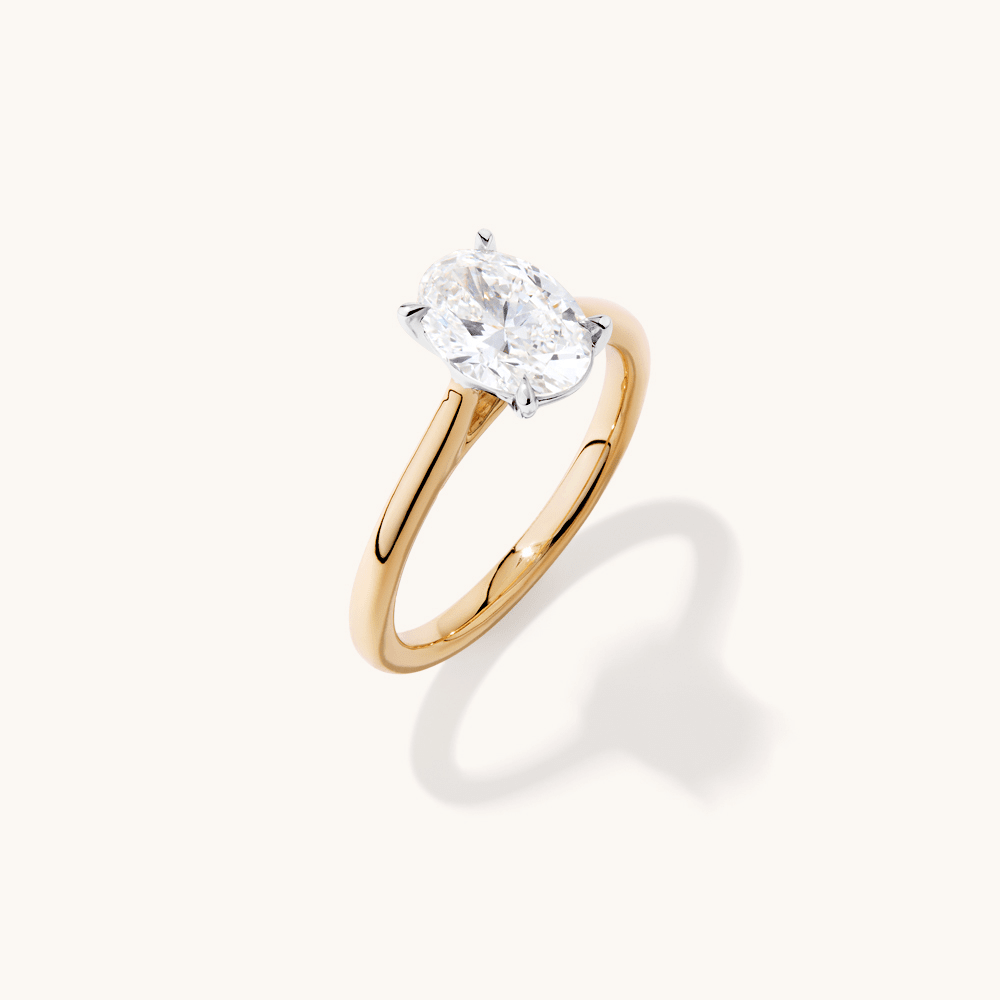 1.50ct Oval Cut Four Claw Solitaire Ring in 9kt Yellow Gold Rings Bevilles 
