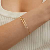 60mm Cubic Zirconia Crossover Bangle in 9kt Bonded Gold Silver Filled Bangles Bevilles 