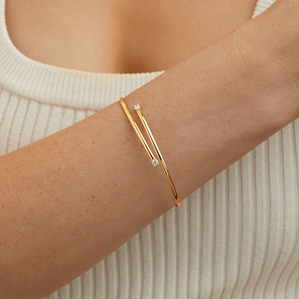 60mm Cubic Zirconia Crossover Bangle in 9kt Bonded Gold Silver Filled Bangles Bevilles 