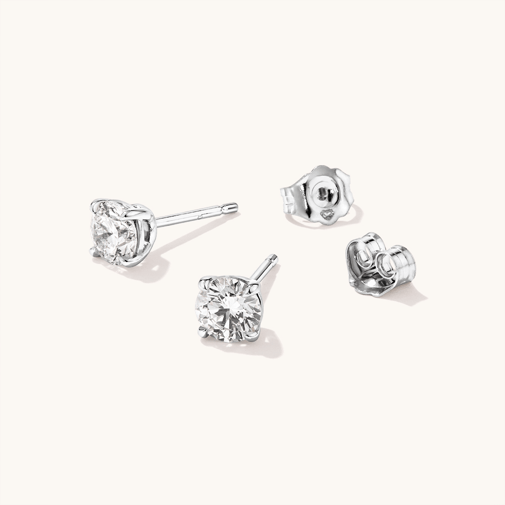 Solitaire Stud Earrings with 1.00tw of Laboratory-Grown Diamonds in Sterling Silver and Platinum Earrings Bevilles 
