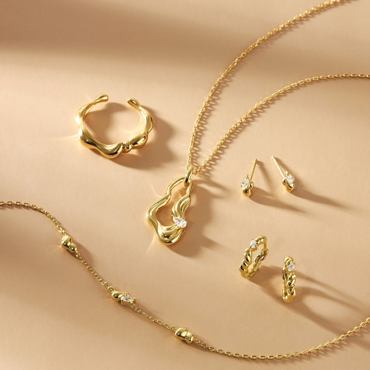 Ania Haie Gold Twisted Wave Huggie Hoop Earrings Earrings Ania Haie 